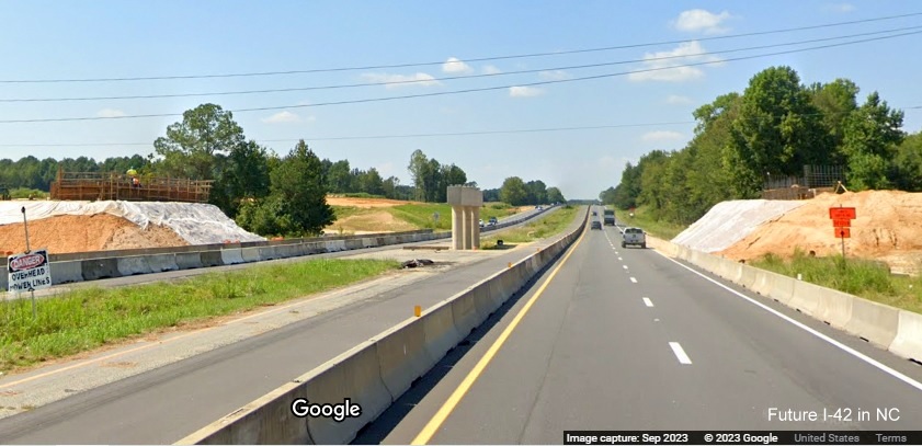 Image of median support in place for future Swift Creek Road bridge under construction along US 70 (Future I-42) West in Johnston County, Google Maps Street View, September 2023