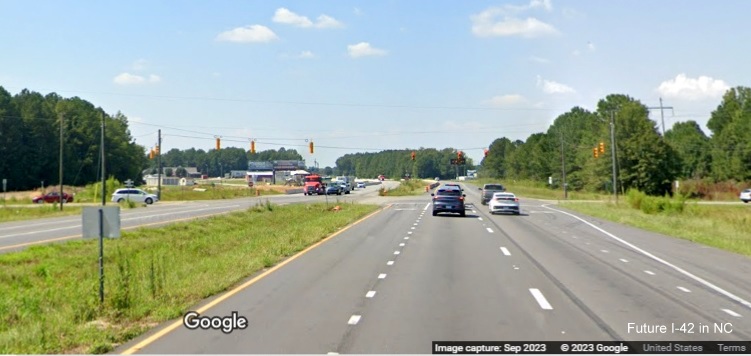 Image of cuttent intersection with Strickland Road along US 70 (Future I-42) West in Johnston County, Google Maps Street View, September 2023