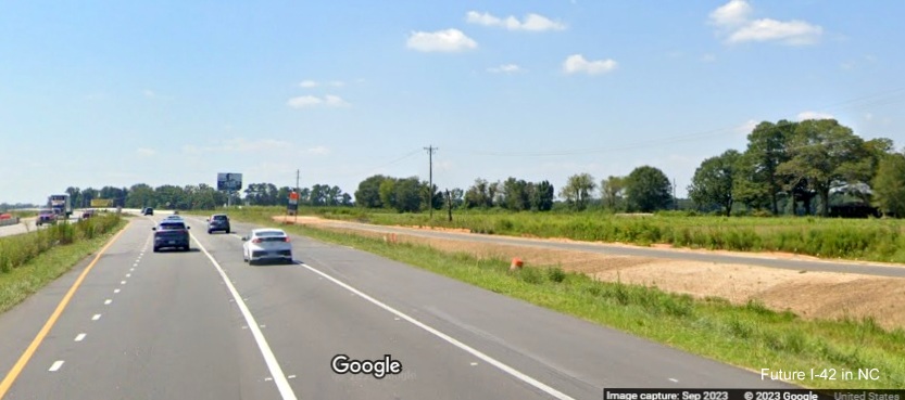 Image of construction along US 70 (Future I-42) West approaching Uzzle Industrial
      Road in Johnston County, Google Maps Street View, September 2023