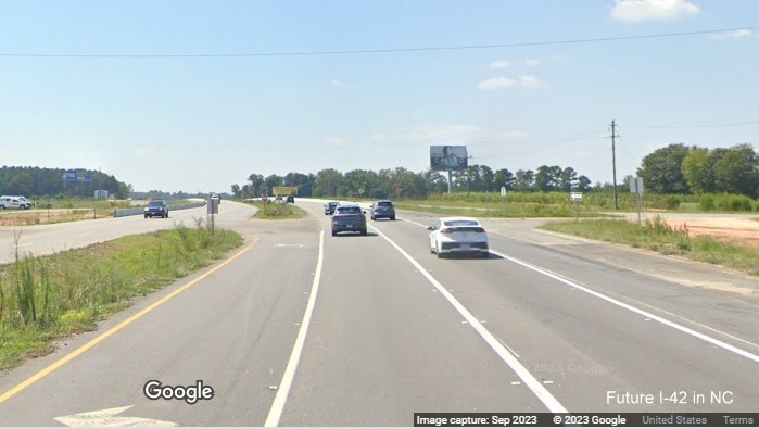 Image of still open intersection along US 70 (Future I-42) West at Uzzle Industrial
      Road in Johnston County, Google Maps Street View, September 2023