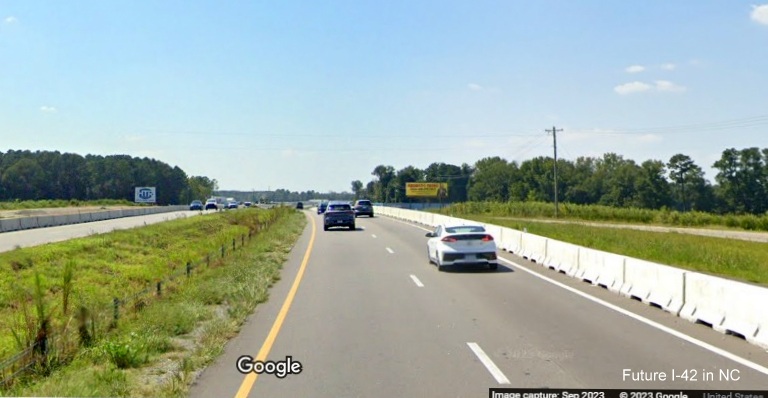 Image of temporary concrete barrier being built along US 70 (Future I-42) West in Johnston County, Google Maps Street View, September 2023