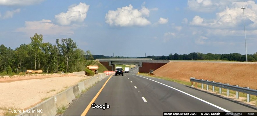 Image of US 70 (Future I-42) East exit ramp approaching ramp bridge carrying NC 540 traffic to I-40 West in Garner, Google Maps Street View, September 2023