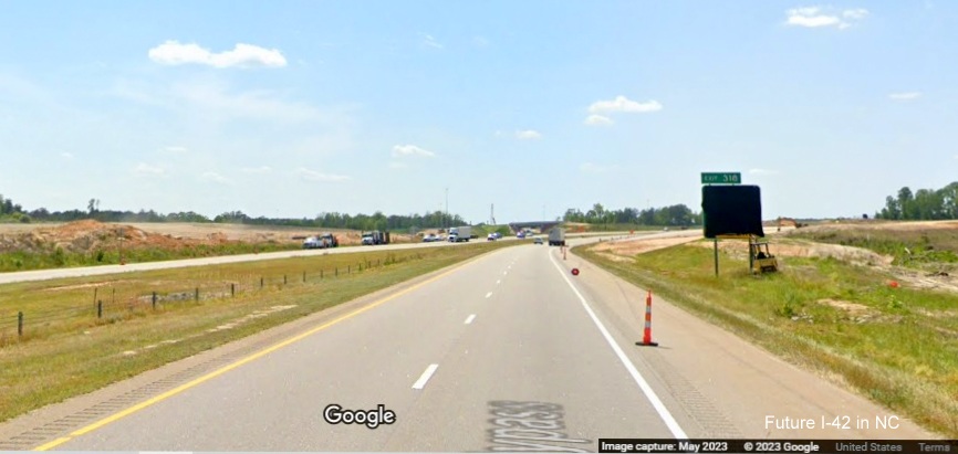 Image of covered 1/2 Mile advance sign for I-40 East exit on US 70 (Future I-42) West Clayton Bypass, Google Maps Street View, May 2023