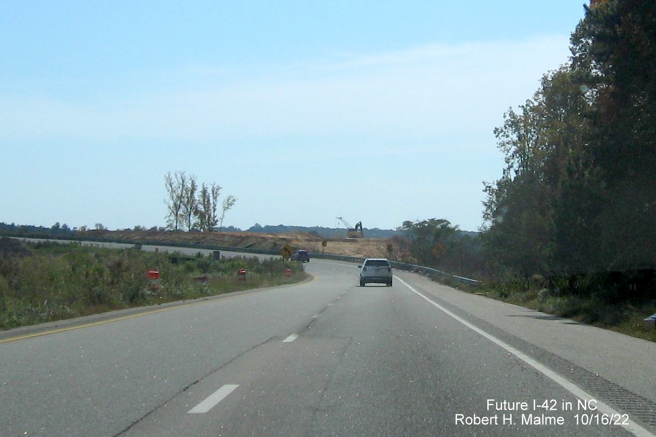 Image of view along ramp from I-40 to US 70 (Future I-42) East Clayton Bypass in widening project and NC 540 construction area, October 2022