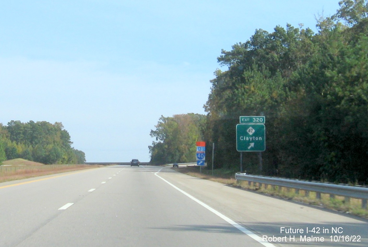 Image of ground mounted 1 mile advance sign for NC 42 exit on US 70 (Future I-42) East Clayton Bypass, October 2022