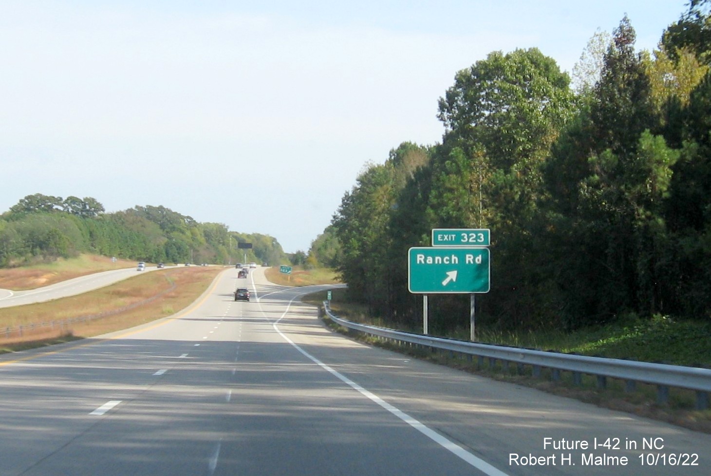 Image of ground mounted ramp sign for Ranch Road exit on US 70 (Future I-42) East Clayton Bypass, October 2022