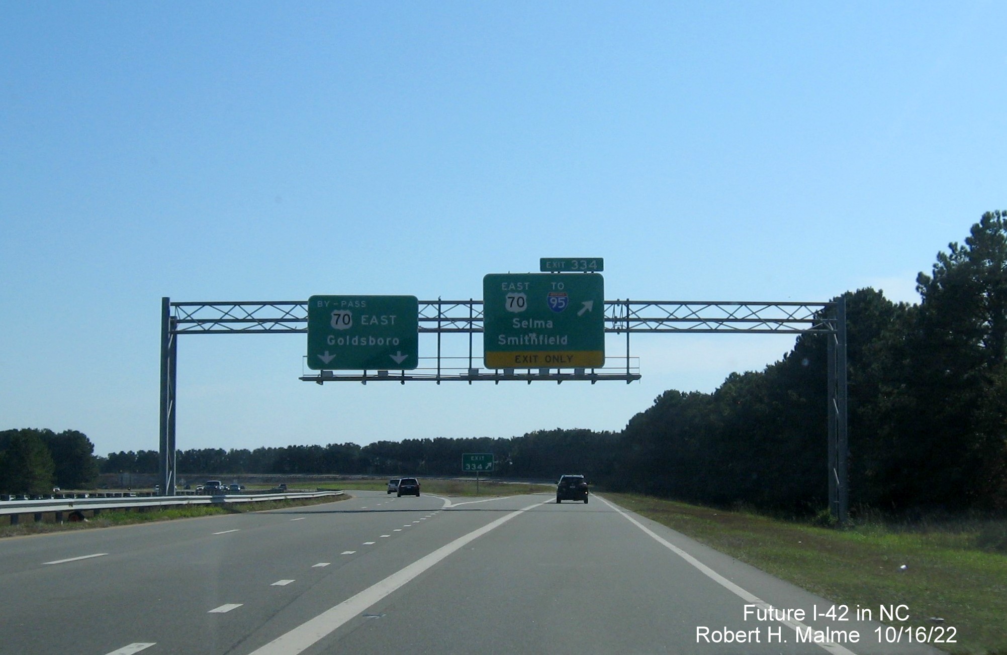 Image of overhead ramp sign for US 70 East to I-95 exit on US 70 (Future I-42) East in Smithfield, October 2022
