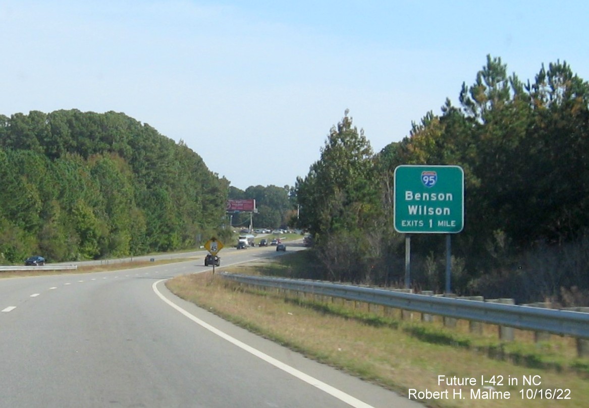 Image of ground mounted 1/2 mile advance sign for I-95 exits on US 70 East in Smithfield, October 2022