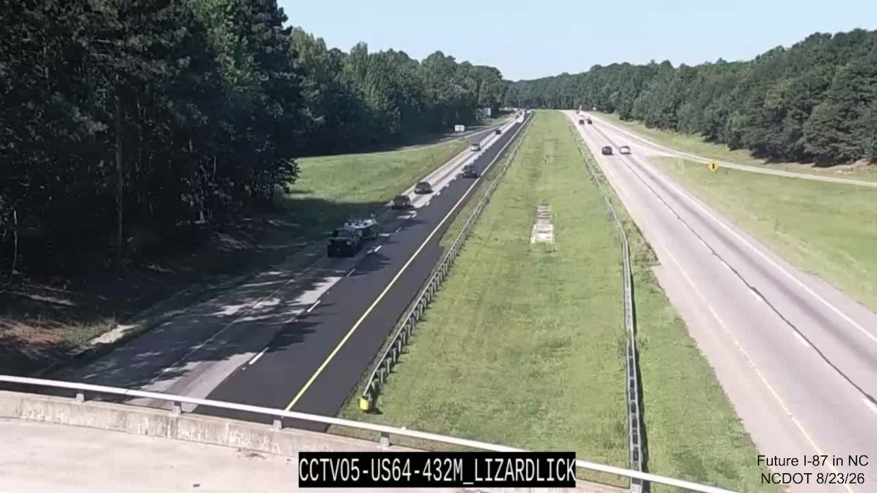 Image from NCDOT traffic camera of initial paving as part of pavement rehabilitation
project along East US 64/264 near mile marker 432, August 2026