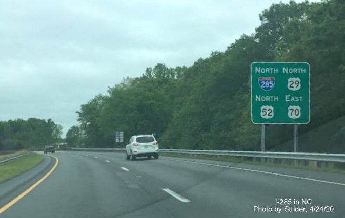 Image of newly placed reassurance marker sign, in front of older signs, in Lexington, by Strider, April 2020