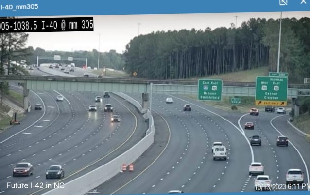 NCDOT traffic camera image of new overhead signage on I-40 East at US 70/US 70 Business exit in Garner, October 2023