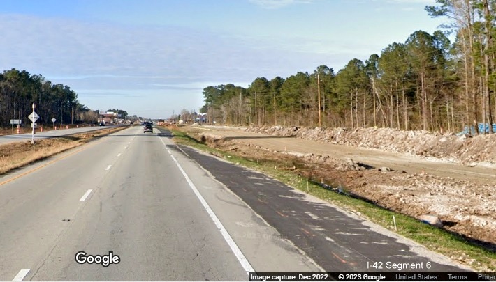 Image of service road construction along US 70 West in James City as part of conversion to Future I-42 freeway, Google Maps Street View, December 2022