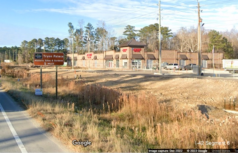 Image of service road construction along US 70 West in James City as part of conversion to Future I-42 freeway, Google Maps Street View, December 2022