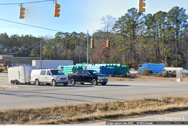 Image of construction equipment at end of project zone at Thurman Road intersection with US 70 in James City as part of conversion to Future I-42 freeway, Google Maps Street View, December 2022