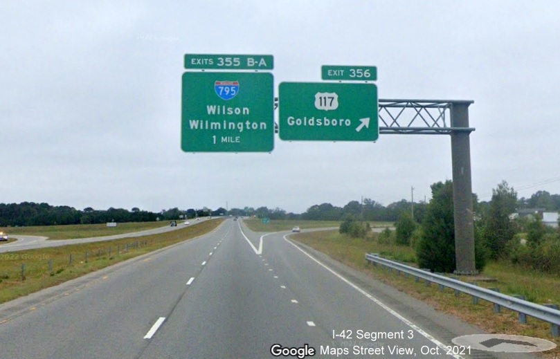 Image of overhead signage at ramp for US 117 exit on US 70 Bypass West around Goldsboro, Google Maps Street View image, October 2021