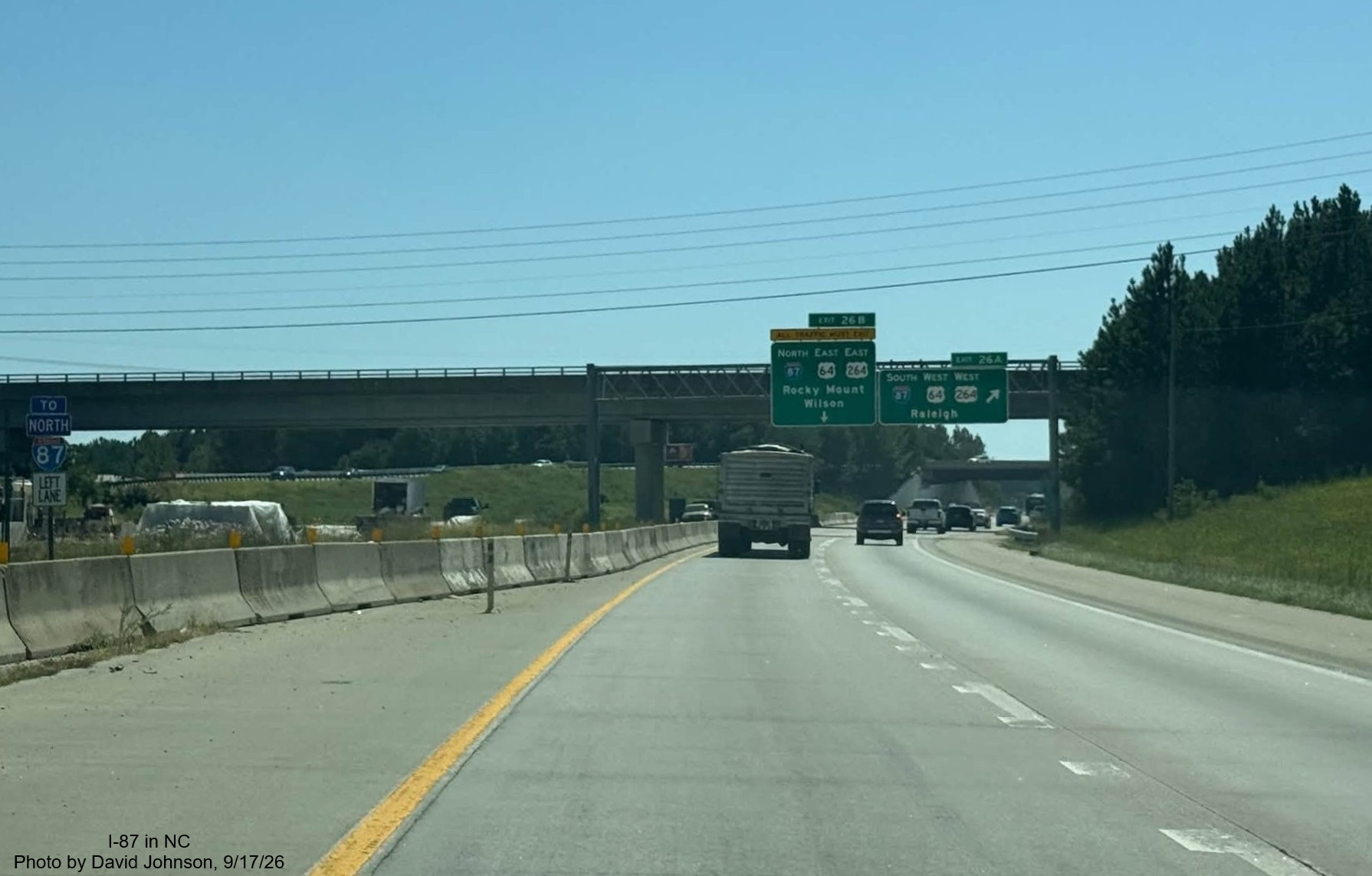 Image of construction at the end of I-540 East and the overhead signs for Knightdale
Bypass in Raleigh, by David Johnson