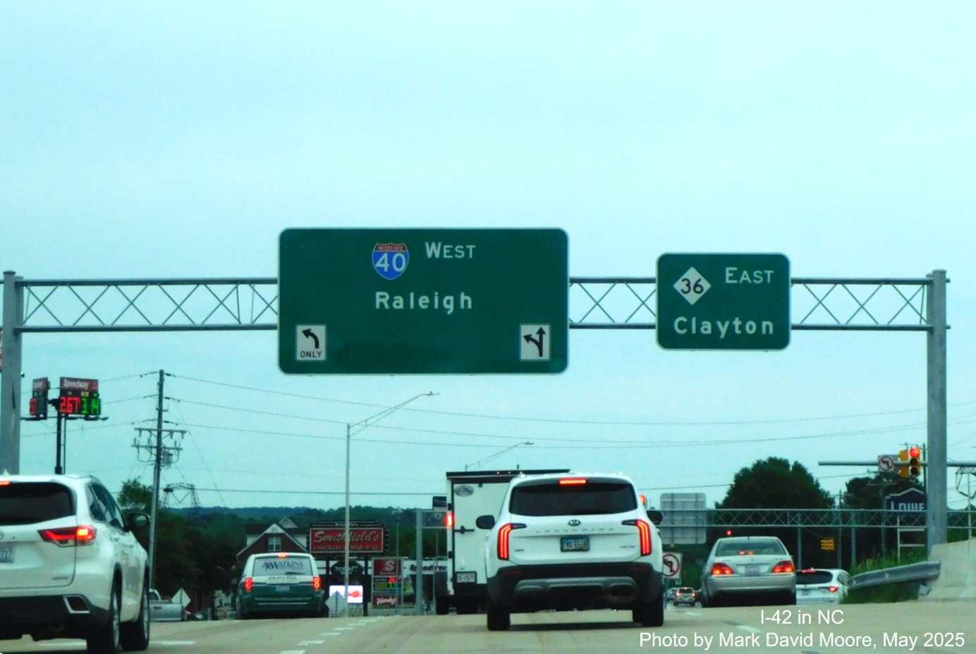 Image of newly placed NC 36 shield on ramp sign at I-40 West in Clayton, by
Mark David Moore, May 2025