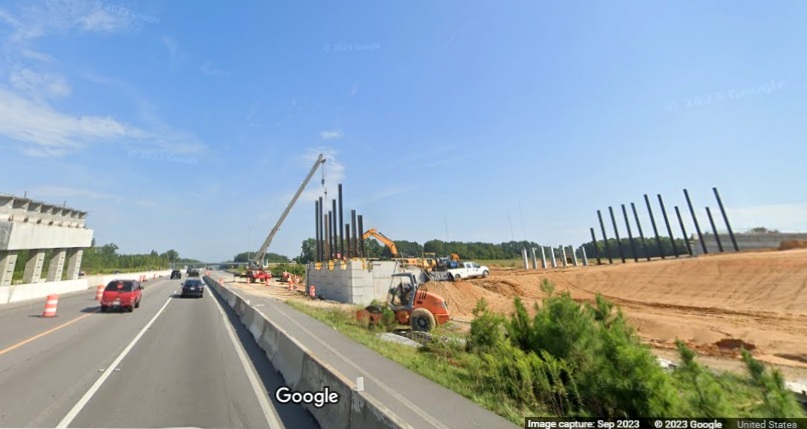 Image of future I-42 West ramp to I-40 East under construction seen from I-40 West in Garner, Google Maps Street View, September 2023