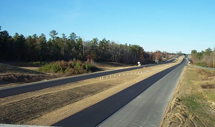 Photo showing new road extending east from intersection of NC 73 and
US 220 near Ellerbe