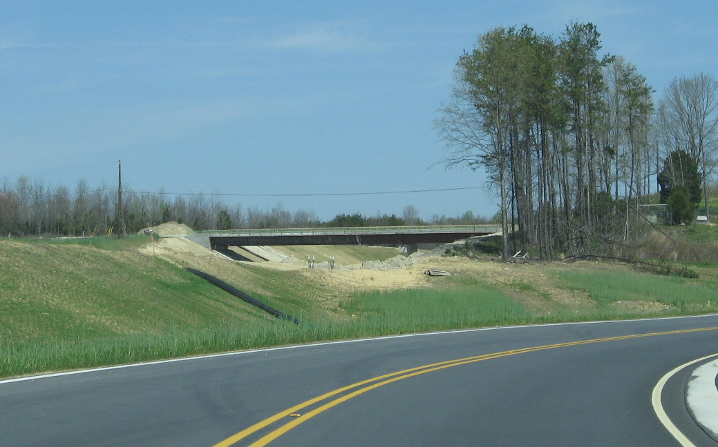 Photo of approaching site of Poole Rd bridge before it opened, April 2009