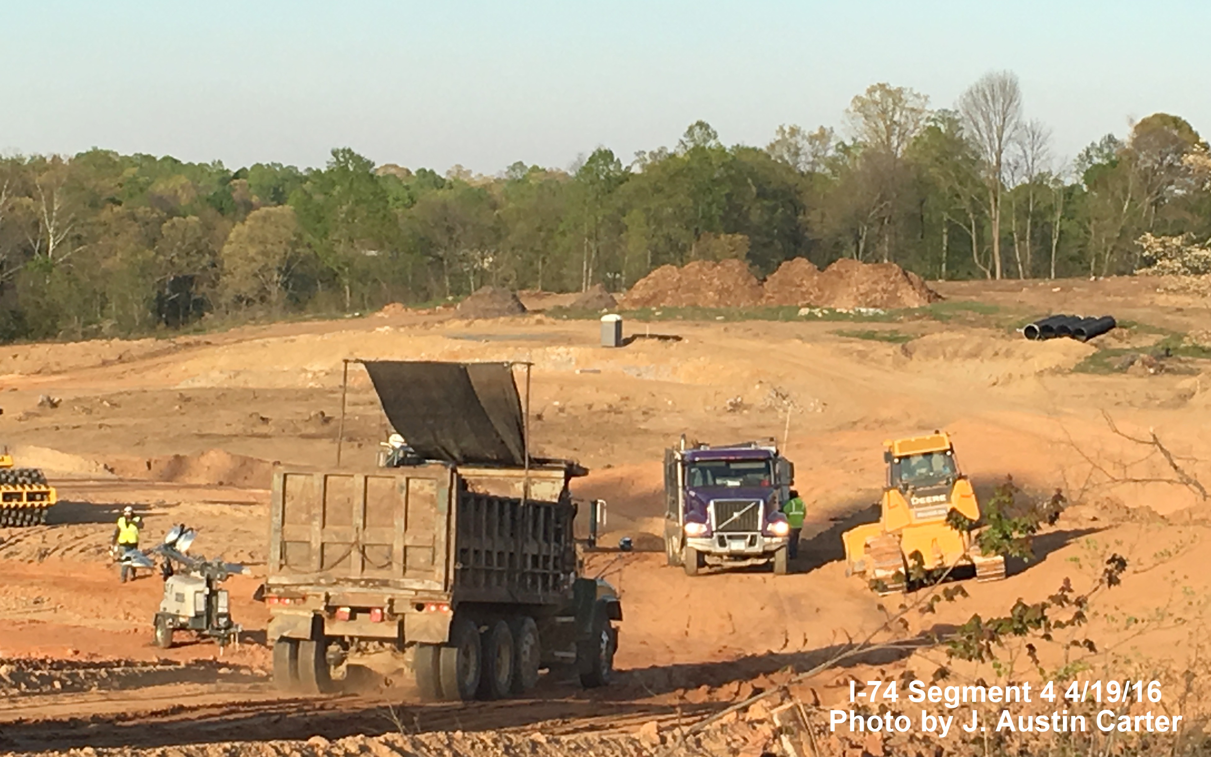Image of construction work clearing area for new interchange between 
		  Beltway/I-74 and Business 40/US 421, by J. Austin Carter