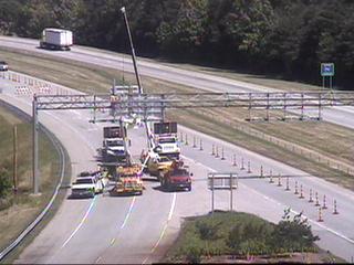 Photo of Exit 65 overhead sign replacement from NCDOT Traffic Camera No. 38 on May 26, 2010