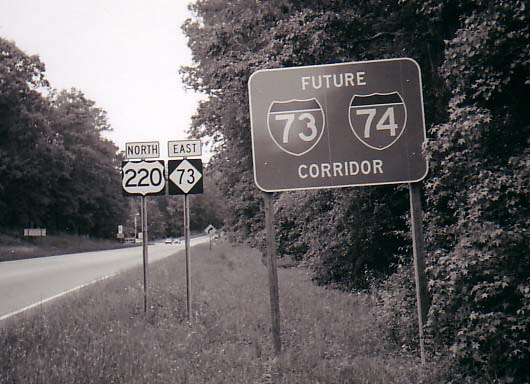 Photo (B&W) of I-74/I-74 Corridor sign placed on US 220/NC 73 north of 
Ellerbe, 2007, courtesy of Adam Prince