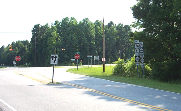 Photo of US 74/NC 130 intersection with NC 242 prior to start of 
interchange construction in July 2006