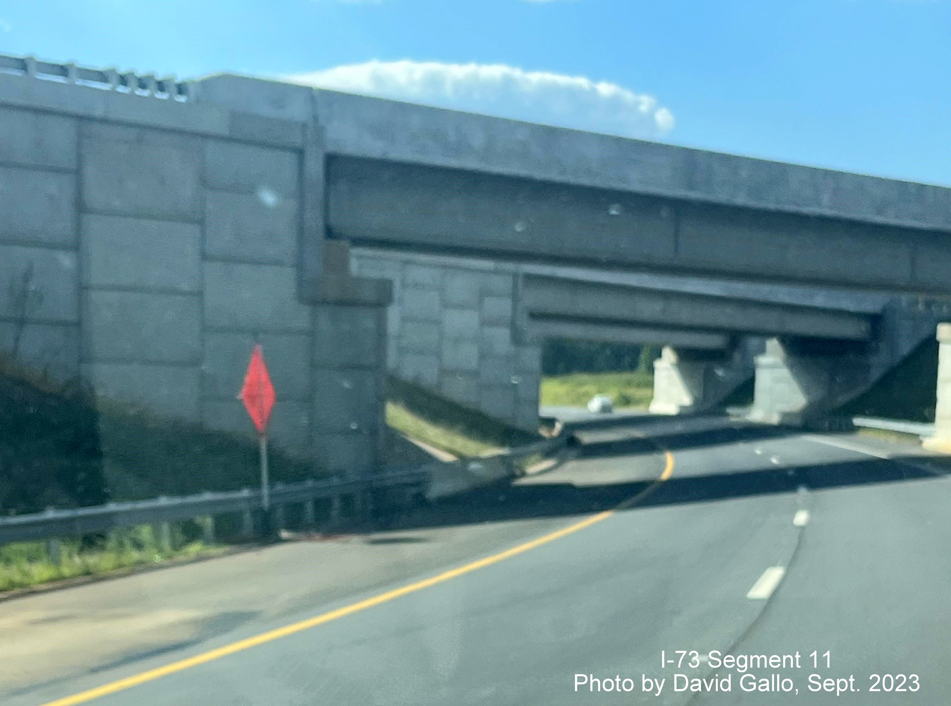 Image of US 74 West heading under ramps for Business 74 and future I-73 North/I-74 West Rockingham Bypass, by 
       David Gallo, September 2023