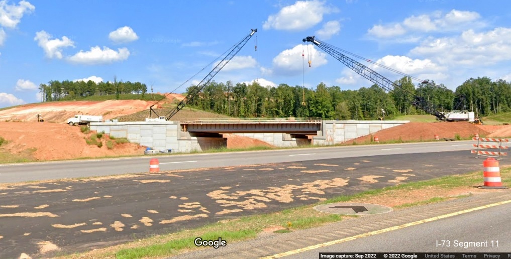Image of ramp bridge being built to carry future I-73/I-74 traffic to Rockingham 
       Bypass from US 74 West, Google Maps Street View, September 2022