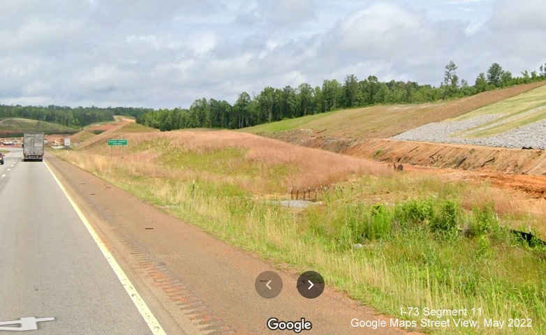 Image from US 74 West of construction ramp paralleling roadway, Google Maps Street 
        View, May 2022
