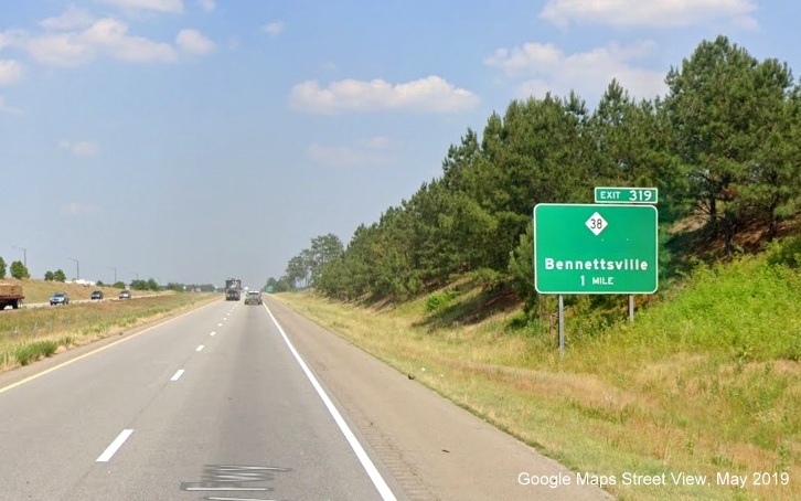 Google Maps Street View image of 1-mile advance sign for NC 38 exit with Hamlet removed 
        as destination on US 74 (Future I-73 South/I-74 East) East in Hamlet, taken in May 2019