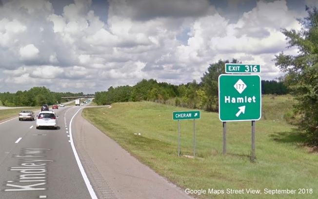 Google Maps Street View image of ground mounted ramp sign for NC 177 
	  exit in US 74 (Future I-73 North/I-74 East) East in Hamlet, taken in September 2018