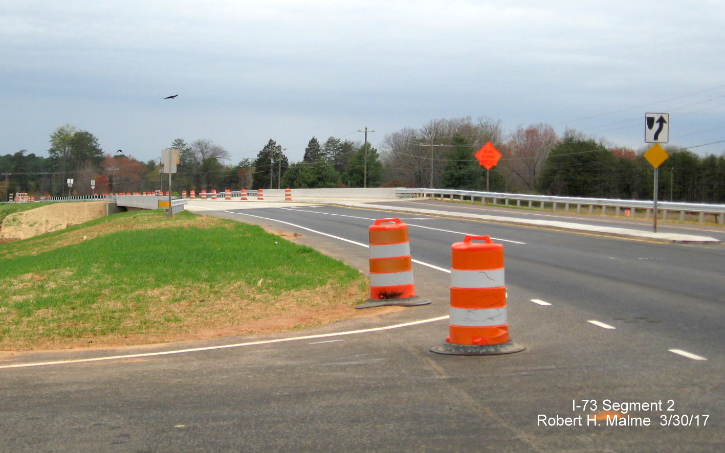 Image of view looking west over nearly completed NC 65 bridge over Future I-73/US 220 freeway in Guilford County