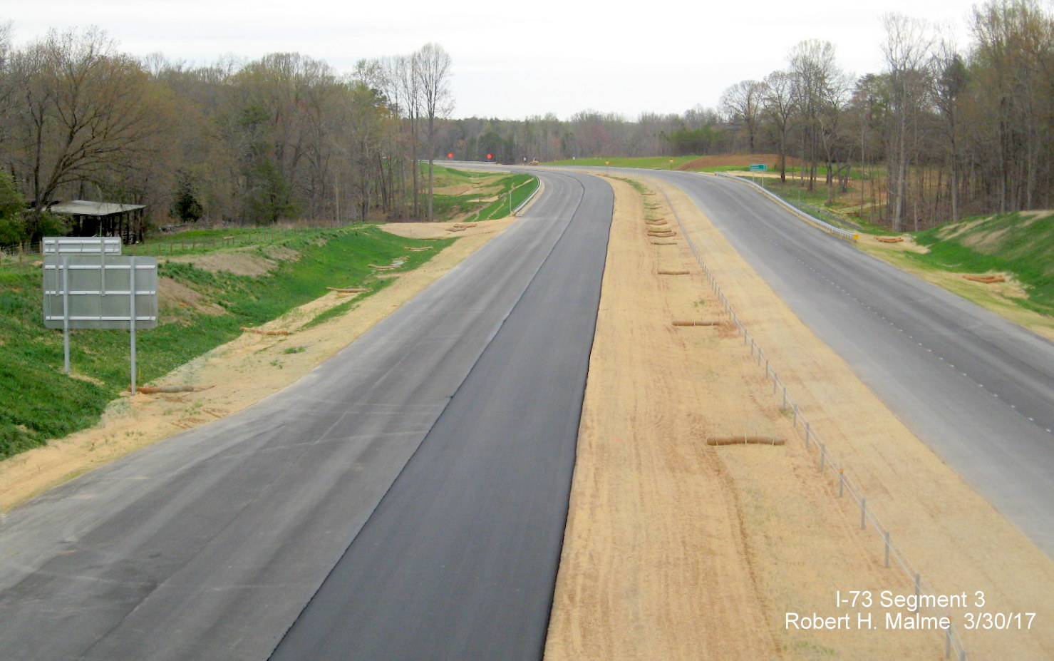 Image taken of view north from Deboe Rd bridge over future I-73 lanes under construction in Guilford County
