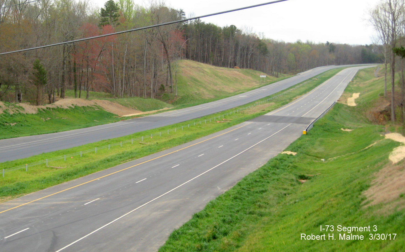 Image taken of view south of Alcorn Rd bridge over future I-73 lanes under construction in Guilford County