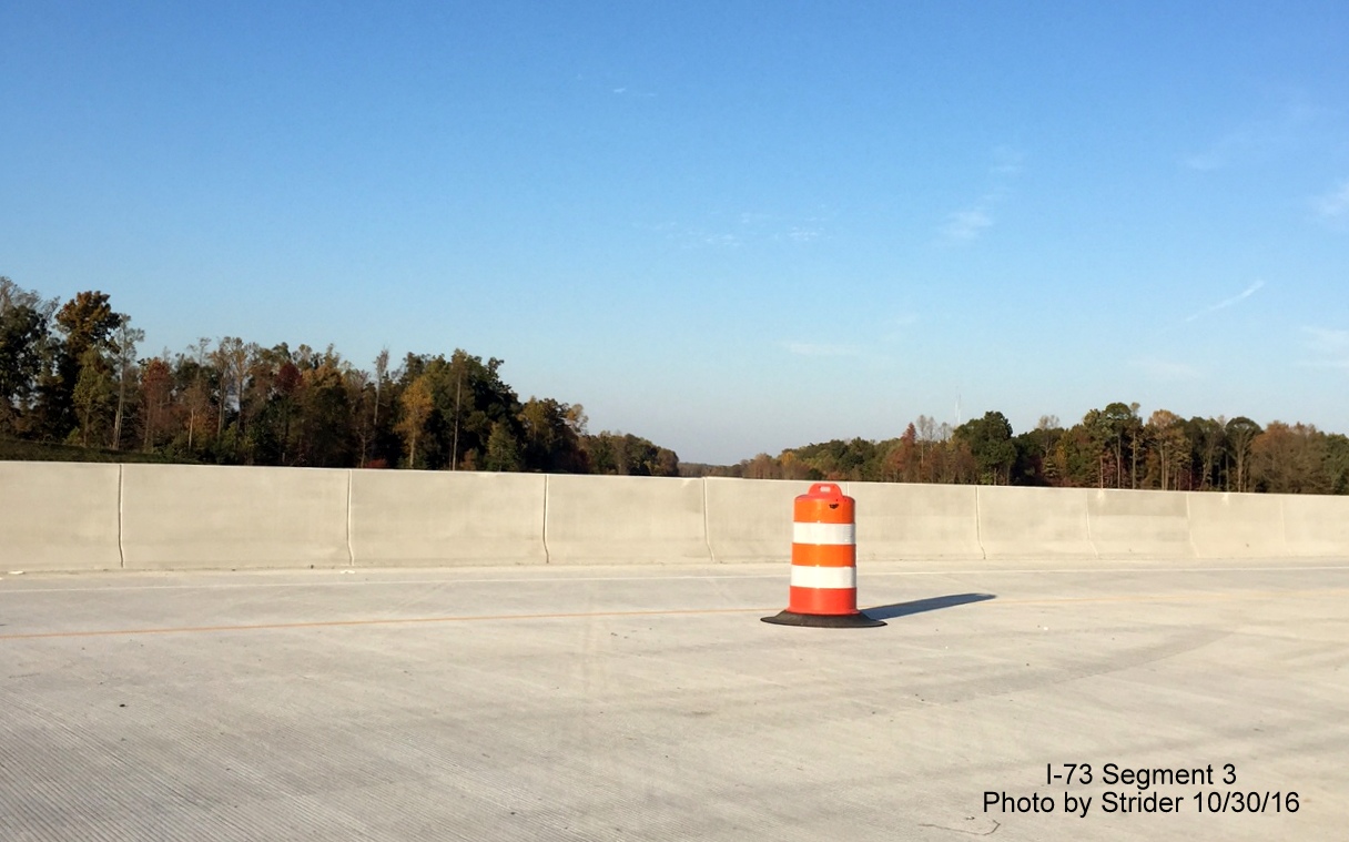 Image of completed bridge on NC 150 near Summerfield over future lanes of I-73, from Strider