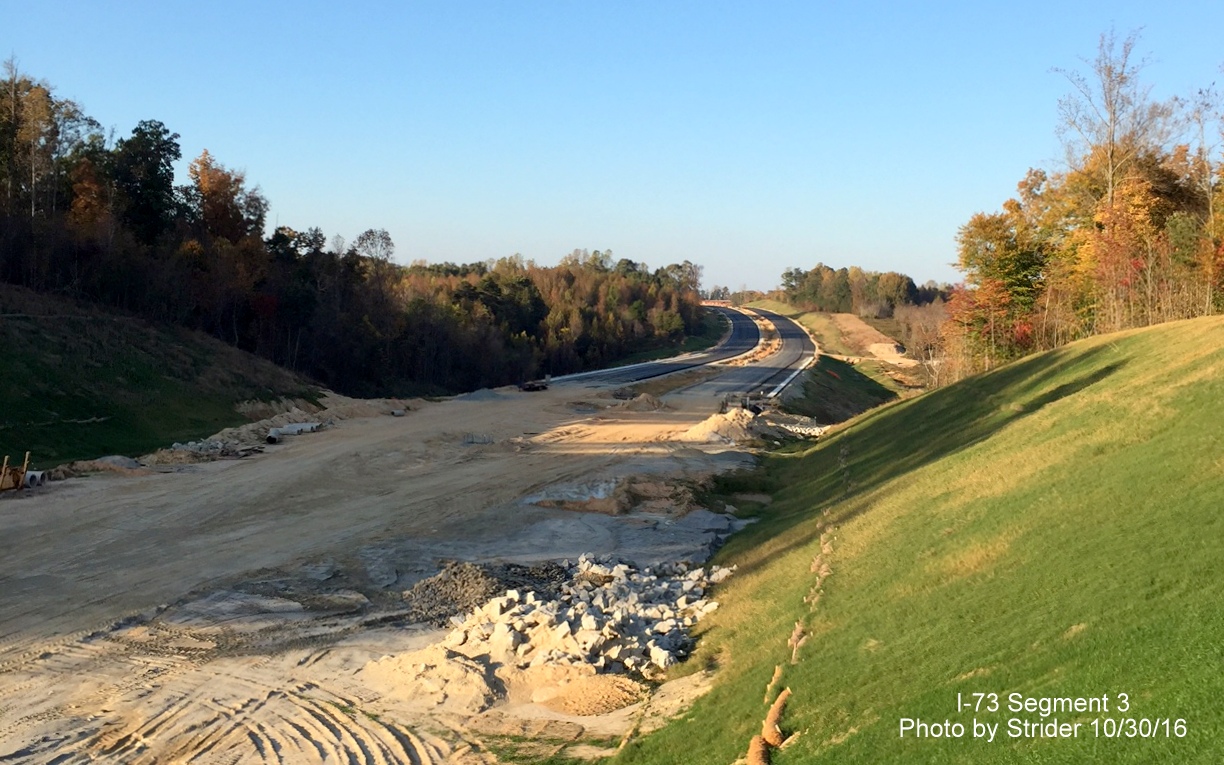 Image showing paving progress north of the new Brookbank Rd. bridge for future lanes of I-73, from Strider