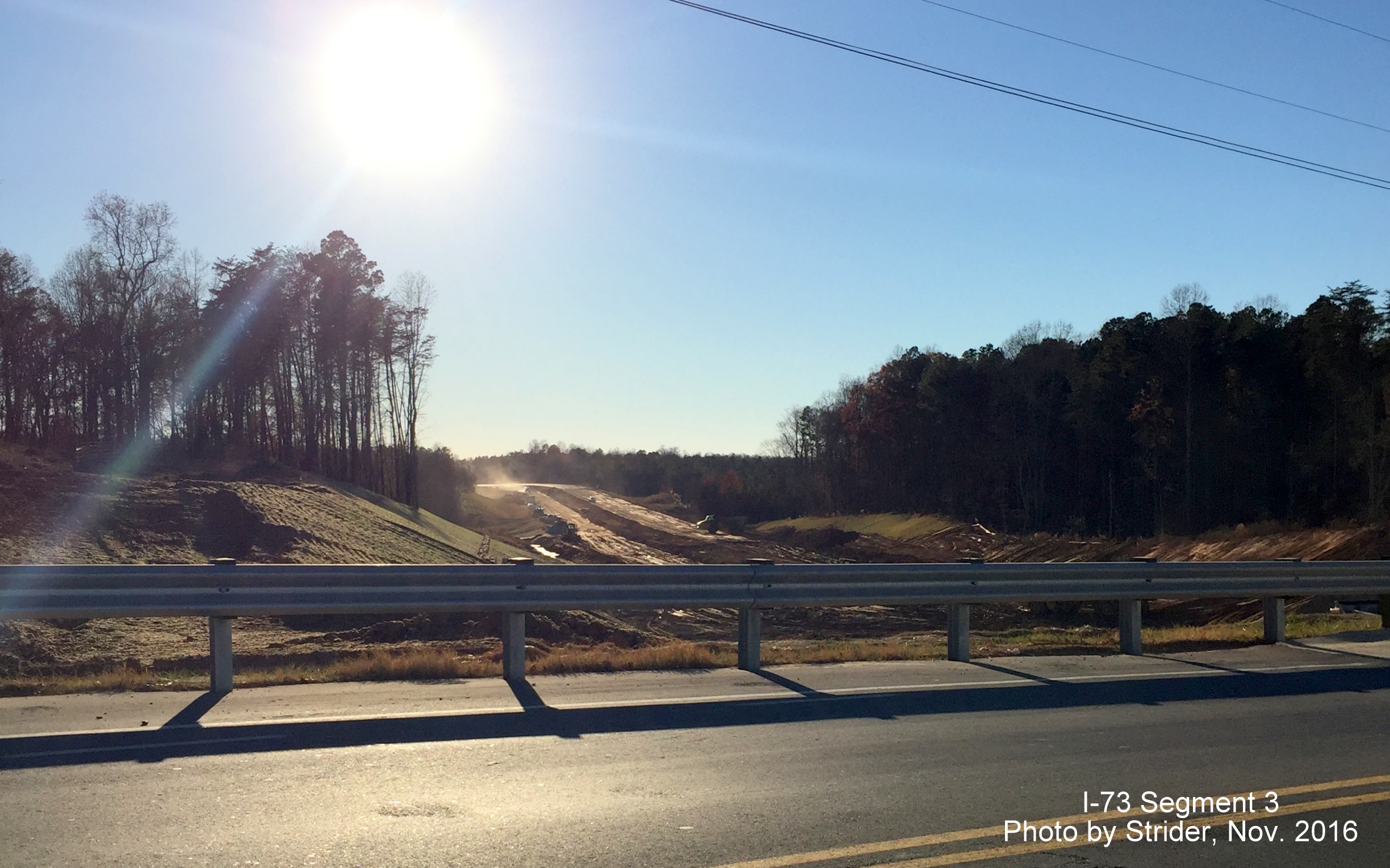 Image of view from Bunch Road looking south toward Alcorn Road showing progress in constructing I-73 lanes, from Strider
