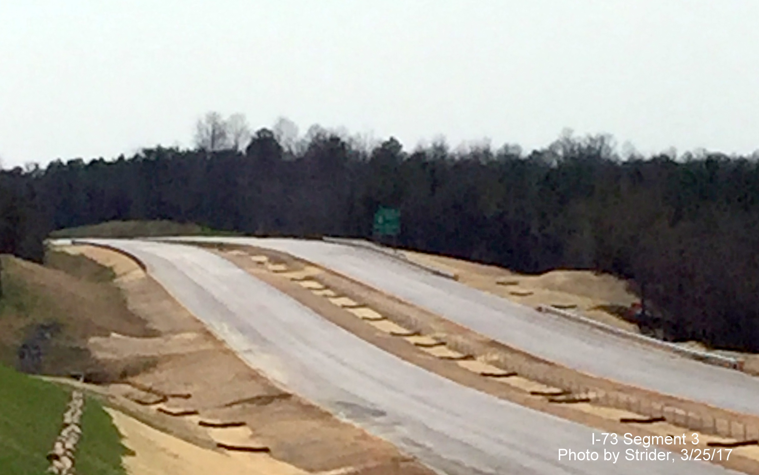 Image of zoomed view of new NC 150 exit sign north of Bunch Road Bridge, by Strider