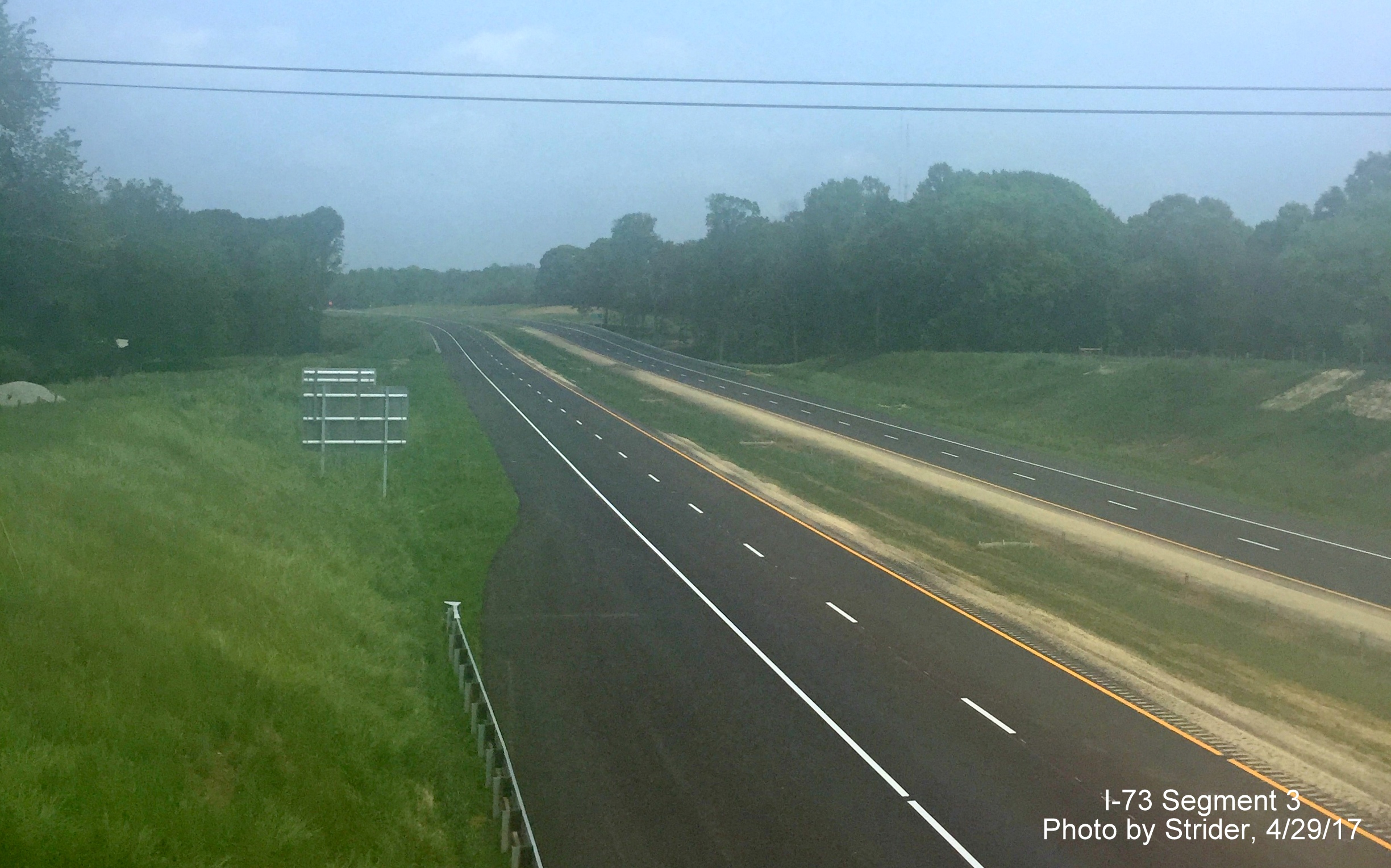 Image taken of view north of Deboe Rd bridge of nearly completed Future I-73 roadway, by Strider