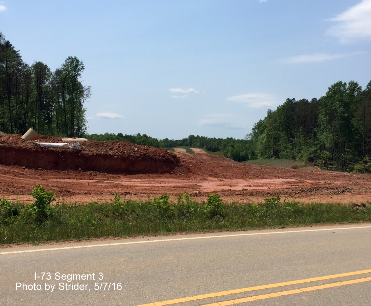 Image looking south across Bunch Rd along future path of I-73, from Strider