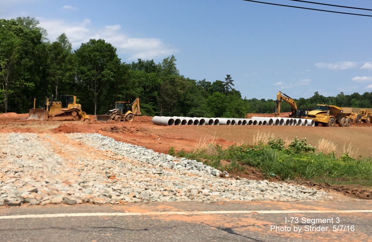 Image looking along current NC 150 at future I-73 interchange showing construction progress on new section of NC 150, from Strider