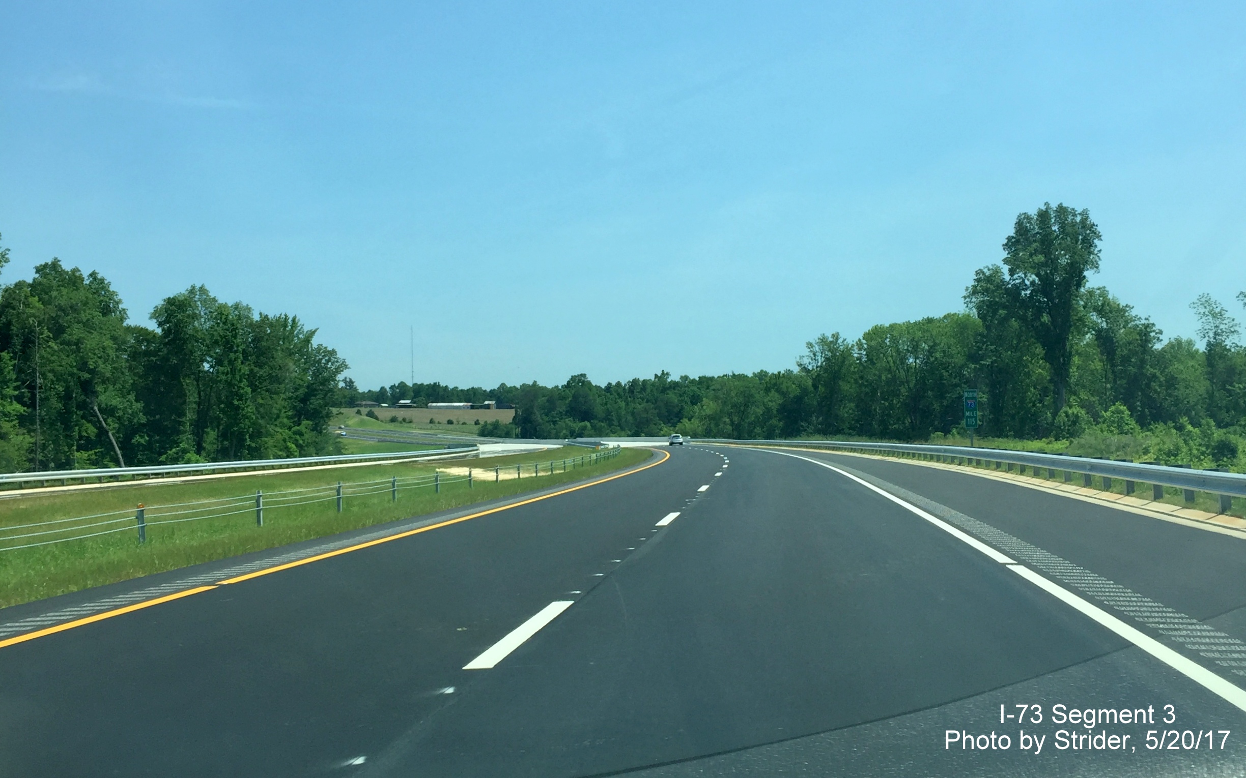 Image taken of new I-73 North highway about to cross Reedy Fork Creek bridge, by Strider
