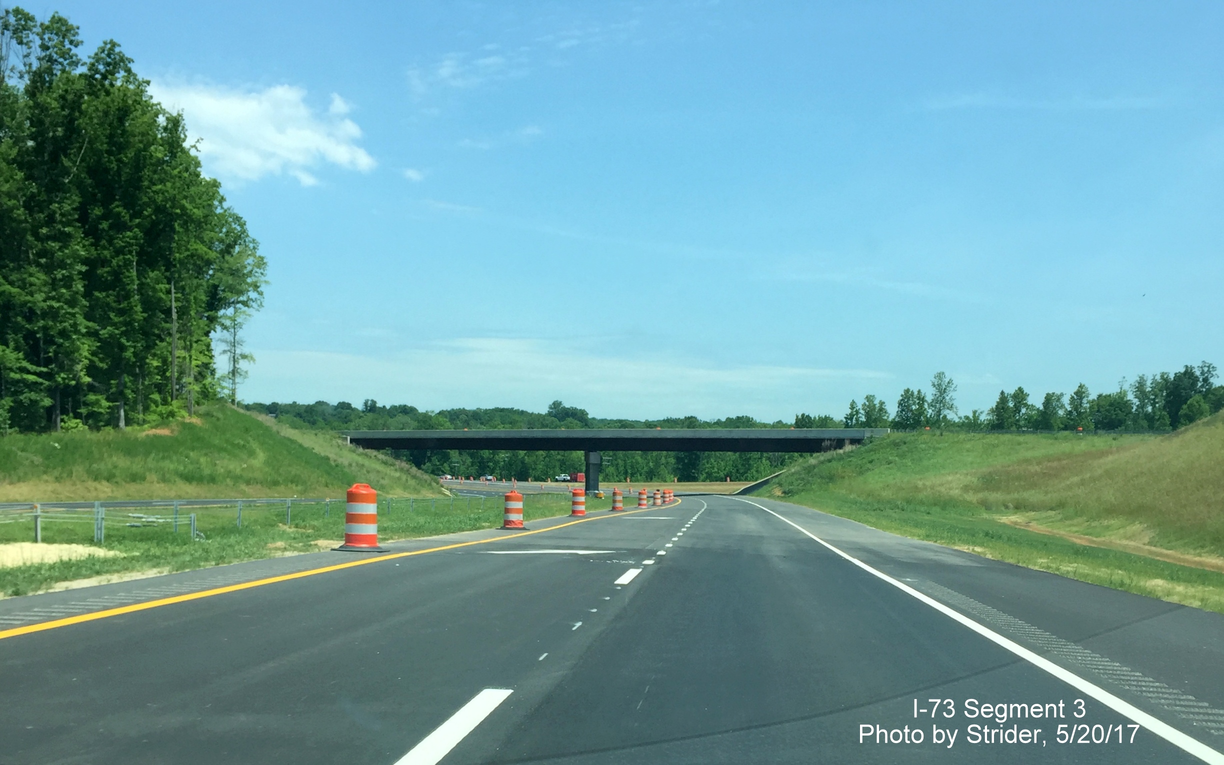Image taken of new I-73 North highway about to cross Reedy Fork Creek bridge, by Strider