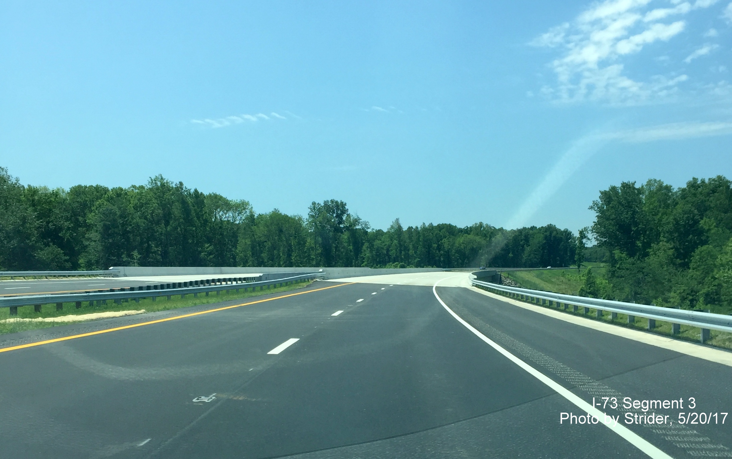 Image taken of new I-73 South highway about to cross Reedy Fork Creek bridge, by Strider