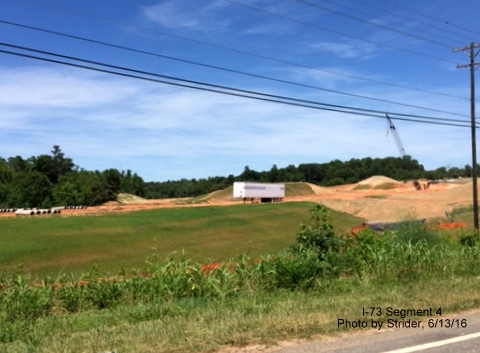 Image of construction in the vicinity of the future I-73/NC 150 interchange, facing south, from Strider