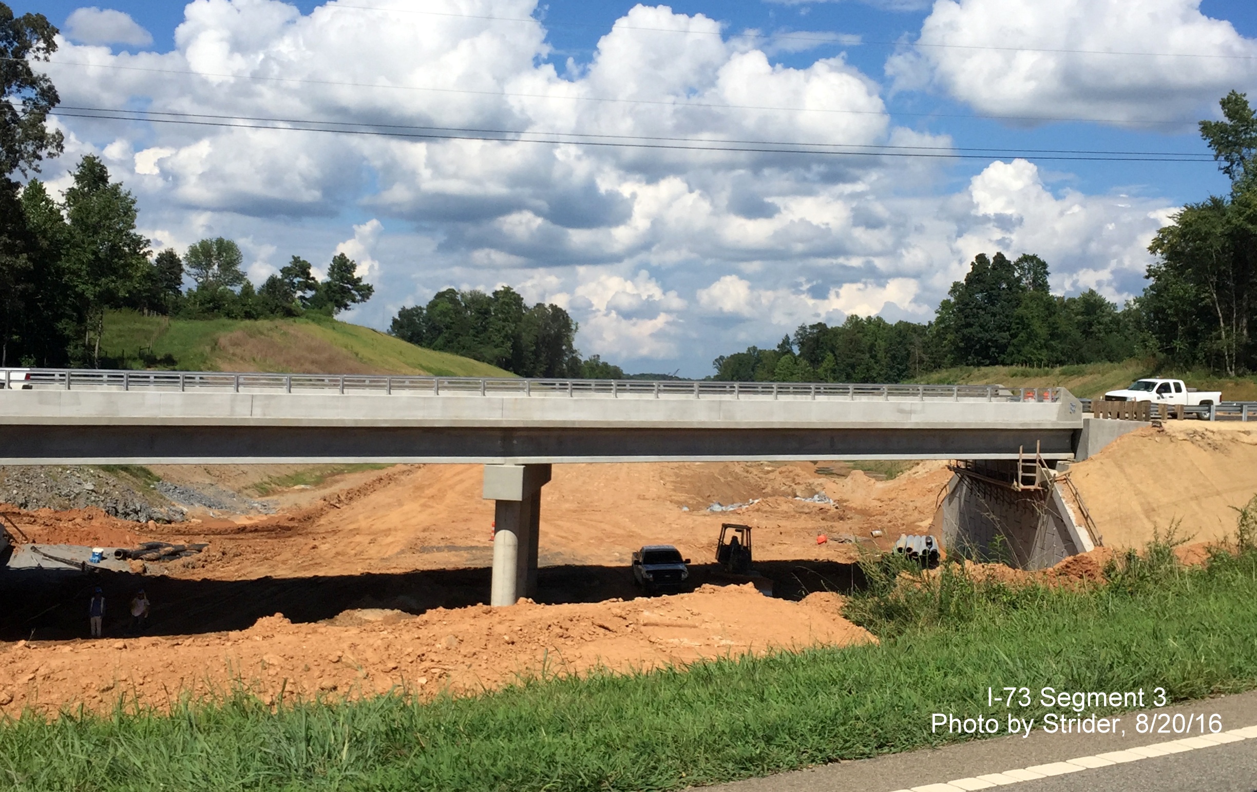 Image of new Bunch Road bridge over future I-73 roadway near Summerfield, by Strider