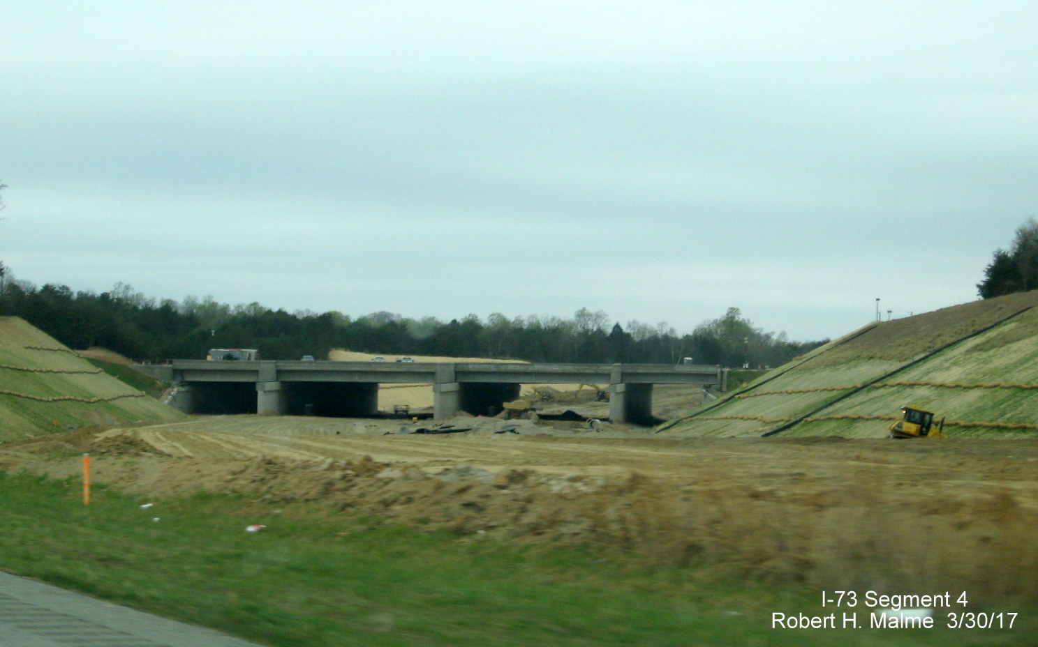 Image showing construction of I-73 Connector and PTI Taxiway bridge from Bryan Blvd in Greensboro