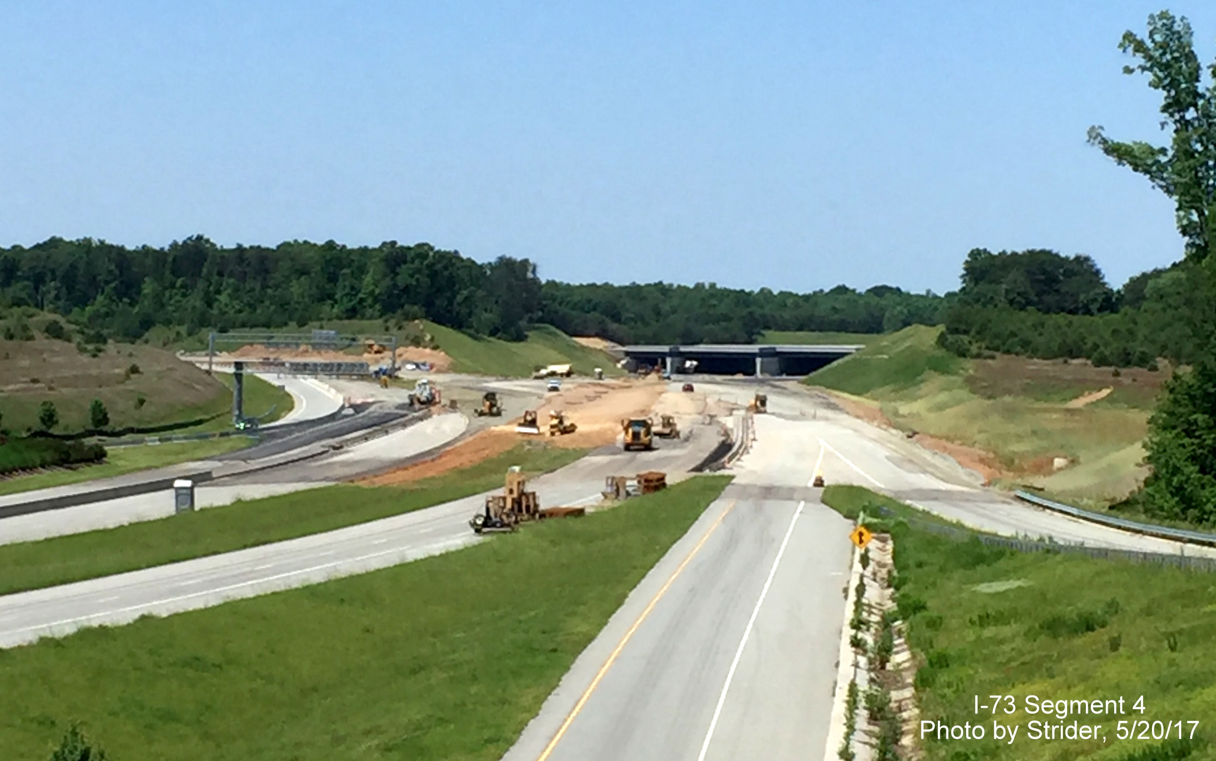 Image taken from Old Oak Ridge Rd bridge over Bryan Blvd showing progress in connecting I-73 to existing roadway, from Strider